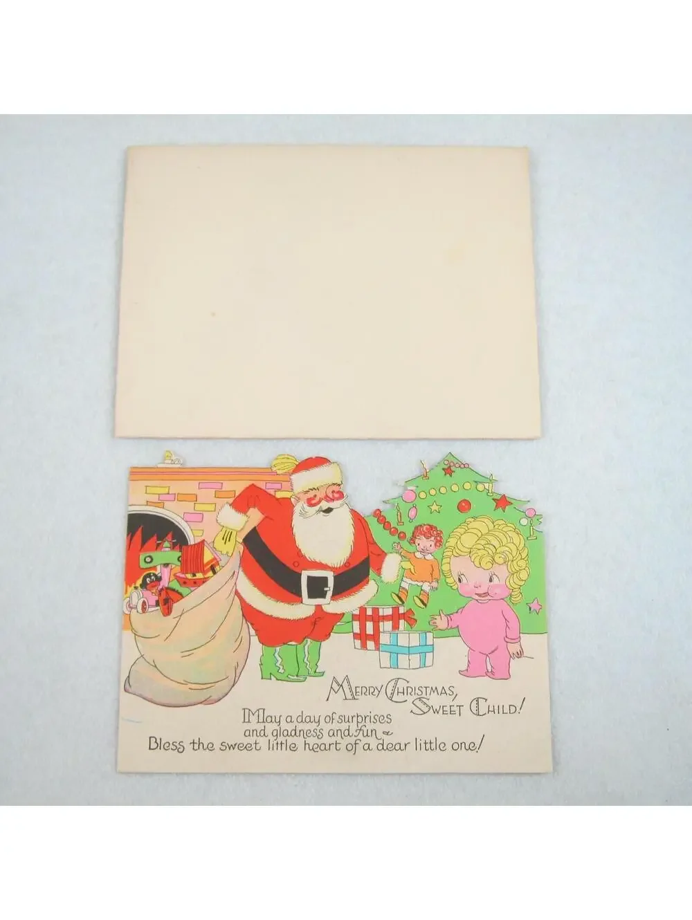 Vintage Christmas Card & Envelope Kewpie Style Girl & Santa Toys Tree Fireplace